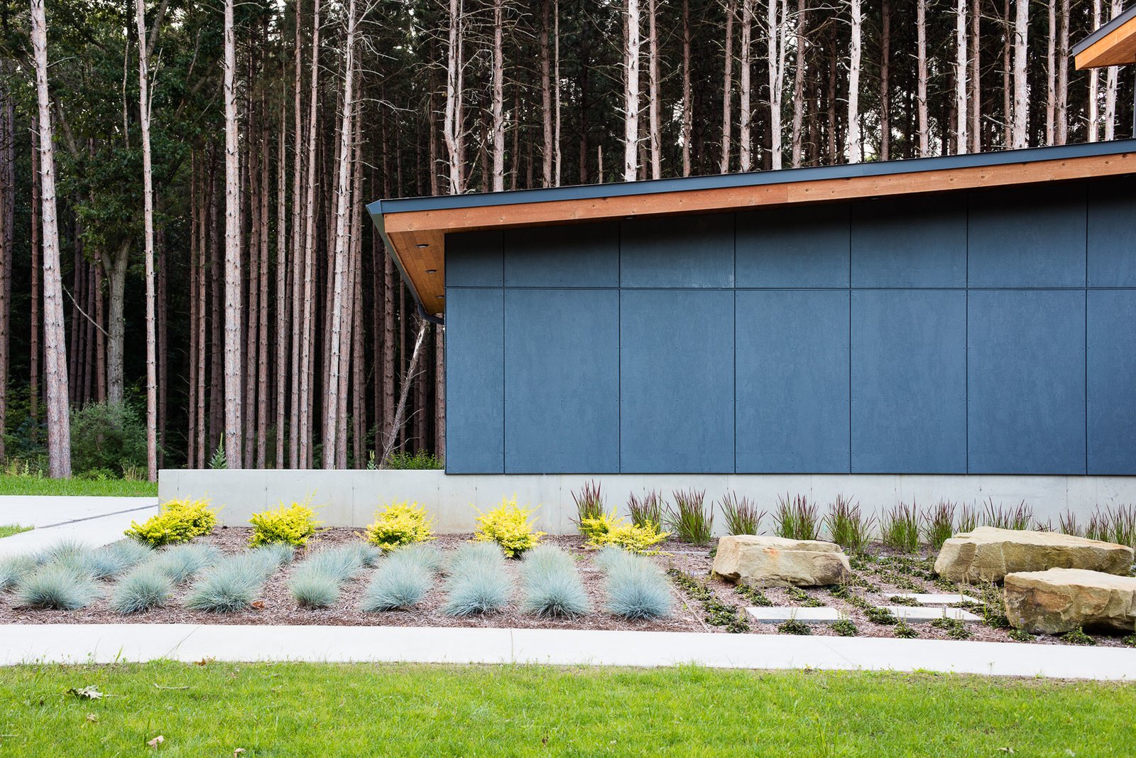 Grays and oranges compliment the natural tones of the site.