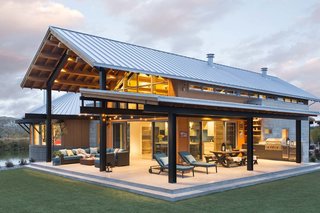 A Yurt-Inspired Vacation Home on the High Desert Plains of Colorado - Photo 7 of 8 - "The central pavilion evolved as a place to house a lot of the functions of the home, and also gave us a structure to build porches and decks for further protection from the sun," says Dominick. The outdoor patio is 1,600 square feet.