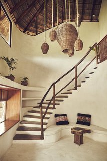 Escape to the Jungle in One of These Modern Forested Retreats - Photo 4 of 10 - Cocooned by jungles along the Mexican Caribbean coast, Papaya Playa Project offers the best of both forest and sea. The design of this eco-friendly resort hotel uses "Chukum," a traditional Mayan building technique that helps keep interiors cool. 