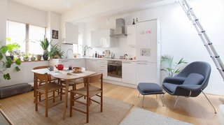 Soak Up the Creative Vibes of London’s East End at One of These Rental Homes or Hotels - Photo 9 of 9 - The Zeitgeist is a cozy one-bedroom apartment in Shoreditch with a touch of retro, plenty of indoor plants, minimalist midcentury furniture, and a large wooden rooftop deck where you can do your morning yoga or enjoy breakfast in the sunshine. 