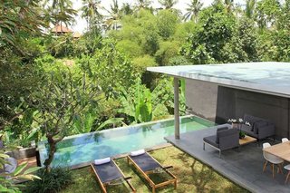 Connect With Bali's Tropical Landscape at One of these Modern Villas - Photo 3 of 10 - Located in the artsy town of Ubud, and nestled within a verdant green valley, the eco-friendly Aria Villas was designed by Singapore architect Chioh-Hui Goh, and offers a fresh take on Balinese style.