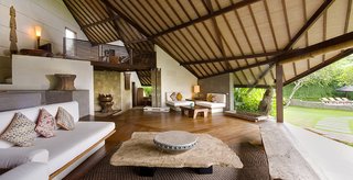 Connect With Bali's Tropical Landscape at One of these Modern Villas - Photo 4 of 10 - Set within a garden estate in Umalas, Villa Bali Bali is a collection of two- and three-bedroom, pitched-roof villas that can be rented separately or together to accommodate groups with as many as 15 people. It was built using natural materials including teak, rattan, and lava stone. 