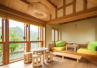 Hide Out in One of These Asian Retreats That Are Immersed in Nature - Photo 10 of 12 - Near the UNESCO World Heritage & Natural Cultural site of Qingcheng Mountain in Chengdu, China, is a place that brings to mind the mythical feel of James Hilton’s "The Lost Horizon." Six Senses Qing Cheng Mountain melds minimalism with classical Chinese forms.