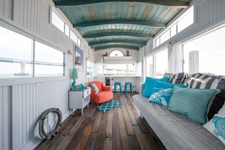 Make Yourself at Home in One of These Small Spaces on Boats That You Can Rent - Photo 5 of 10 - Located in a peaceful marina in downtown Charleston, South Carolina, this compact and cozy houseboat was gutted and refurbished with reclaimed materials and can house three people comfortably.