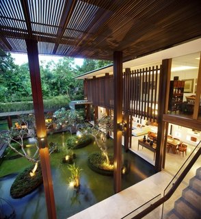 10 Homes With Large, Well-Ventilated Courtyards - Photo 5 of 9 - This house in Singapore was designed to be used without air-conditioning. When designing the space, the architect considered a number of factors, including increased ventilation, coolness, and protection from the strong heat and torrential rains.