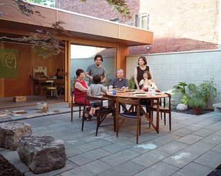 10 Homes With Large, Well-Ventilated Courtyards - Photo 6 of 9 - The courtyard in this Toronto home is where the family can catch some sun during the warm summer months, while still maintaining their privacy.
