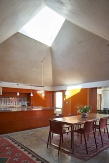 10 Light-Filled Homes With Interesting Skylights - Photo 4 of 10 - The six interconnected pyramidal pavilions of Red Tin House by London practice Henning Stummel Architects have high ceilings and generous skylights. The low contour of the roof maximizes the spatial volume of the house and the natural light that floods in through the wide skylights.