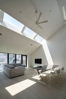 10 Light-Filled Homes With Interesting Skylights - Photo 8 of 10 - Australian practice PandA Studio Architecture designed House Nakamaruku in Kanagawa, Japan, with skylights on the upper level that bring in plenty of natural light without compromising privacy.