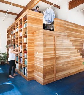 10 Homes With Clever Storage Solutions - Photo 4 of 10 - When renovating his home in Emeryville, California, architect Peter Benoit of Melander Architects custom-designed a 16-by-17-by-10-foot wooden box that accommodates a bedroom within, a dressing room mezzanine above, and a bookcase on one of its sides.