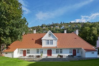 12 Modern Hotels in Historic Buildings Around the World - Photo 1 of 24 - Built by Bergen merchant and philanthropist Alexander Kaae around 1760 to be a restful retreat for the downtrodden, Villa Terminus was refurbished by Swedish architecture and design firm Claesson Koivisto Rune. They transformed it into an 18-room boutique hotel with timeless midcentury-inspired and contemporary interiors.