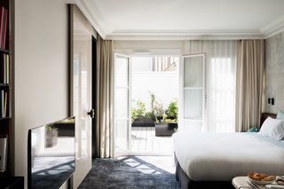 12 Modern Hotels in Historic Buildings Around the World - Photo 8 of 24 - The interiors of Les Bains in Paris, France