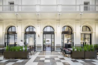 12 Modern Hotels in Historic Buildings Around the World - Photo 15 of 24 - Housed in a restored 140-year-old state treasury building in the downtown area of Perth, Australia, Como The Treasury’s 48 rooms and suites have high ceilings, cornicing, and balconies.