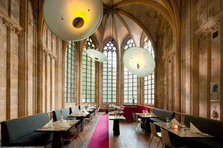 12 Modern Hotels in Historic Buildings Around the World - Photo 20 of 24 - The interiors of Kruisherenhotel in Maastricht, the Netherlands