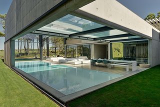 A Pool With a Glass Bottom Hovers Over Another at a House in the Portuguese Riviera - Photo 2 of 12 -
