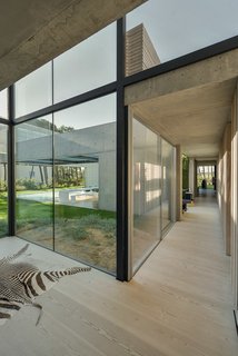 A Pool With a Glass Bottom Hovers Over Another at a House in the Portuguese Riviera - Photo 9 of 12 -