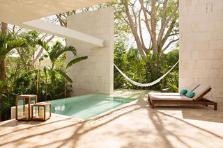 7 Modern Hotels in Mexico You Have to Visit - Photo 1 of 7 - A 19th-century estate in the Yucatán jungle was given new life as a modern Mexican hotel with villa-style abodes, bath tubs made from polished rock, and casitas with their own pool and outdoor showers. 