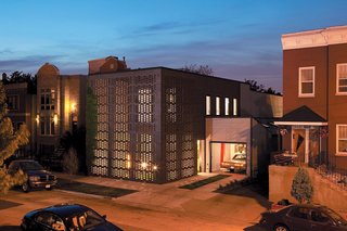 10 Modern Structures That Use Brick in Interesting Ways - Photo 2 of 10 - The most distinctive feature of this Chicago home is its two-sided, honeycomb-patterned, brick-screen facade that lets in sunlight and fresh air in the day, and turns the home into a dazzling light box at night.