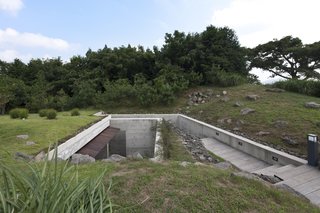 8 Subterranean Homes That Are Out of This World - Photo 3 of 8 - Also by Korean firm BCHO is Jedong Ranch, a house in Jeju Island, South Korea, that has a long staircase that leads down to an underground meditation space.
