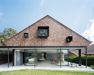 11 Amazing Australian Homes - Photo 6 of 11 - When renovating this 1930s Arts and Crafts-style bungalow in Sydney, TRIBE Studio Architects used vertically and horizontally stacked bricks in three different shades to create an interesting, modern facade at the garden-facing rear of the property. 