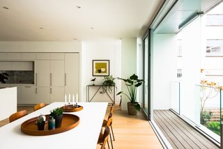 6 Best Dwell UK Apartments - Photo 1 of 7 - In the Barnsbury Conservation Area, a historic area of Georgian houses, London-born, San Francisco-based architect Mark Dziewulski designed a modern, steel-and-glass apartment complex called Barnsbury Square Lofts, which consists of 10 light-filled and stylish loft units with large windows and high-quality interiors. 