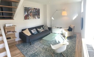 Experience New York City's Eclectic Side at One of These Modern Short-Term Rentals - Photo 11 of 11 - This simple and compact fifth-floor apartment in Gramercy has a lofted bedroom, making it perfect for a traveling couple. 