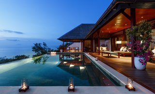 7 Incredible Island Villas in Indonesia - Photo 1 of 7 - Surrounded by protected coral reefs and thriving marine life, this dive resort in Southeast Sulawesi has spacious ocean-view villas with outdoor spa showers. The island can only be reached through a private three-hour charter flight from Bali, so expect a high level of exclusivity.