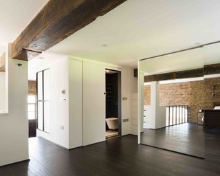 An Old Grain Warehouse on the River Thames Is Transformed Into an Industrial-Modern Home - Photo 7 of 11 -