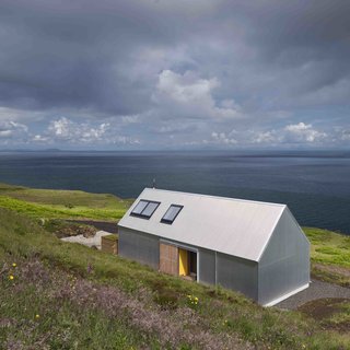 9 Traditional-Turned-Modern Cottages You Can Rent in the UK - Photo 6 of 9 - Though not made of stone or brick like the other homes in this roundup, this two-person escape designed by Rural Design Architects on Scotland’s Isle of Skye was made with corrugated metal, a material that's commonly used for agricultural sheds or "crofters cottages" in the rural areas of Scotland.