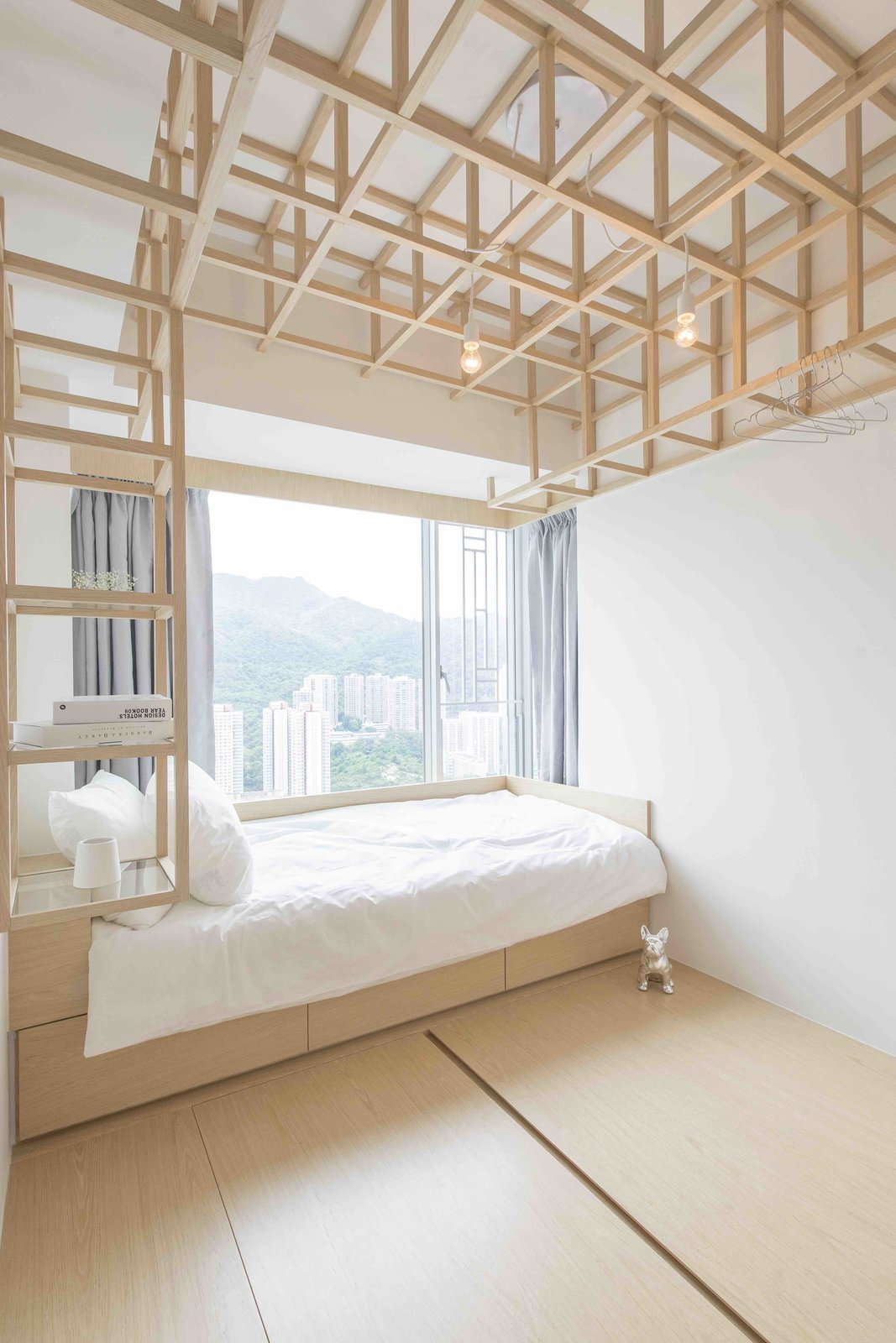 For this 780-square-foot apartment Hong Kong apartment, local practice MNB Design Studio used plywood, smart storage solutions, and tapped into the principles of origami to create a highly structured, minimalist home.