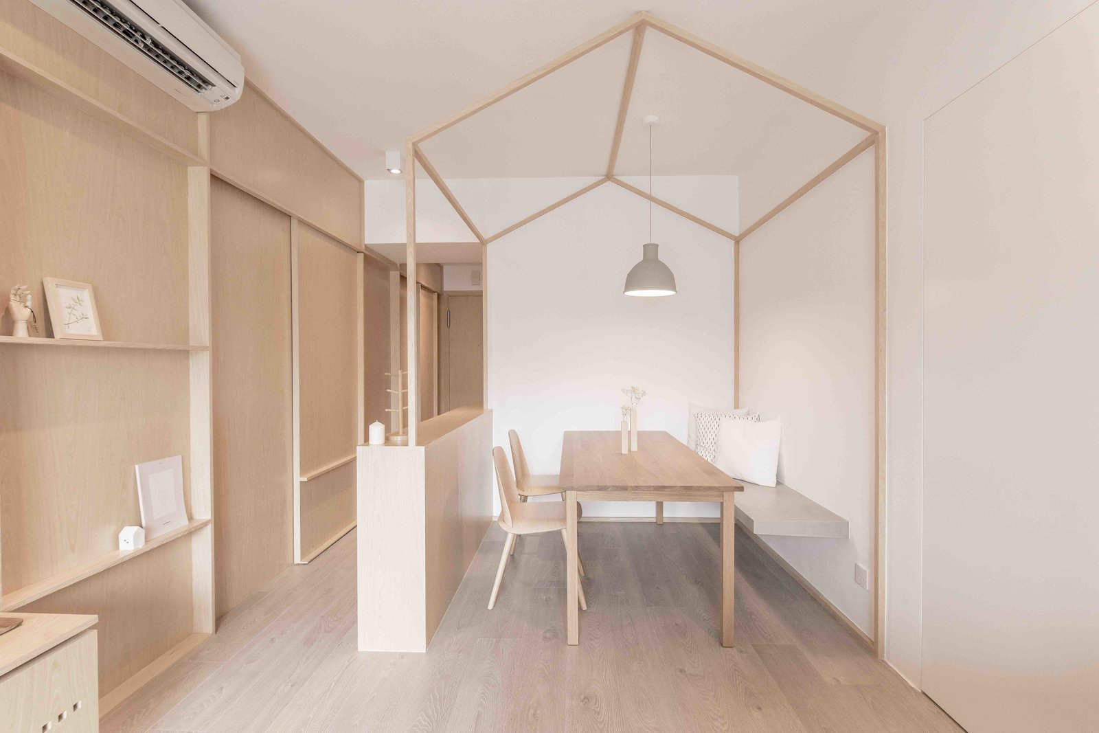 For this 780-square-foot apartment Hong Kong apartment, local practice MNB Design Studio used plywood, smart storage solutions, and tapped into the principles of origami to create a highly structured, minimalist home.