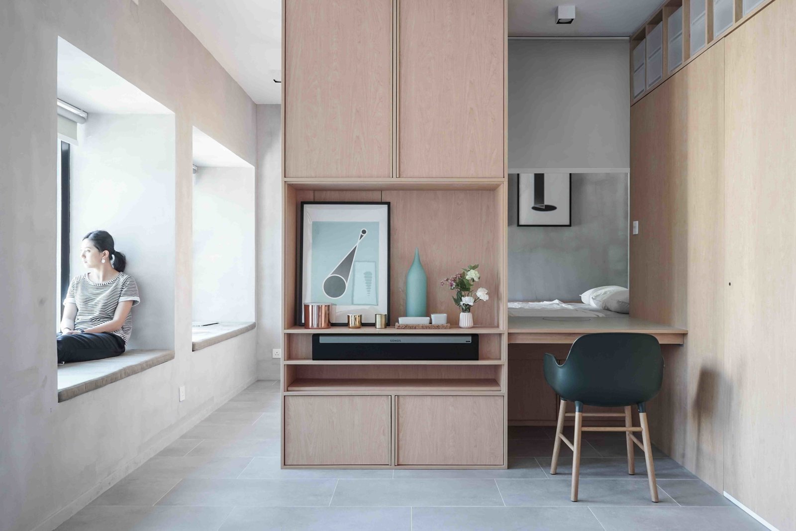 Inspired by modern Japanese minimalism, Hong Kong practice JAAK demolished the walls of this two-bedroom apartment and remodelled it into a studio with an