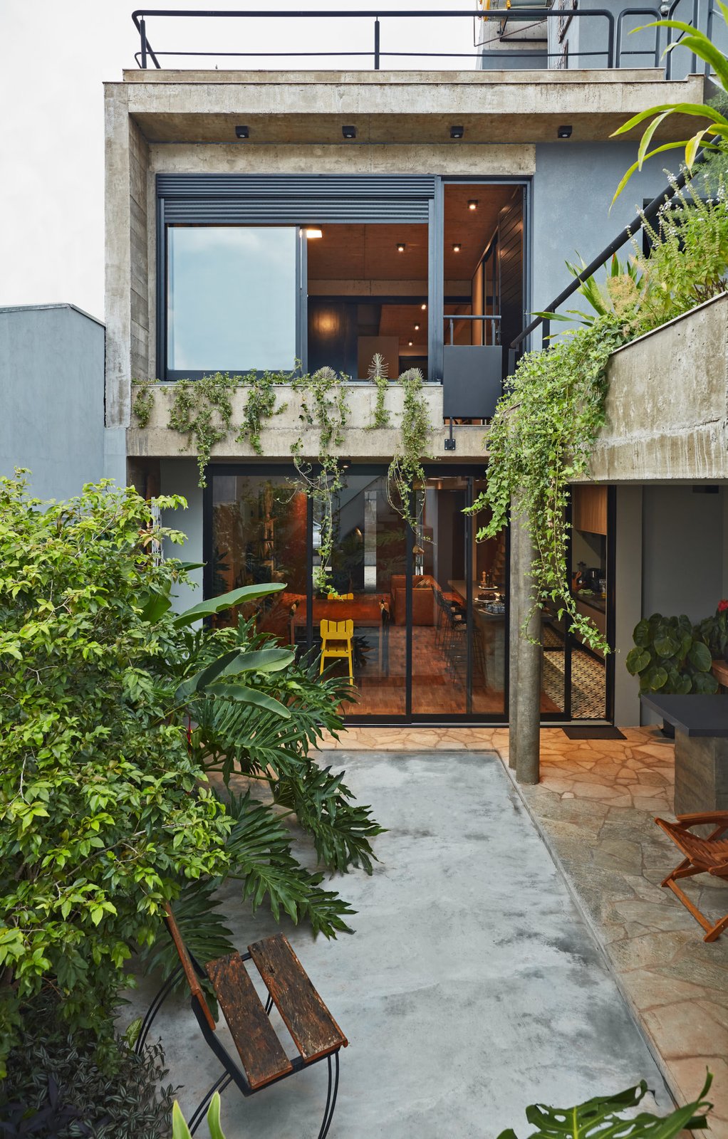 A backyard garden with an outdoor grilling station.