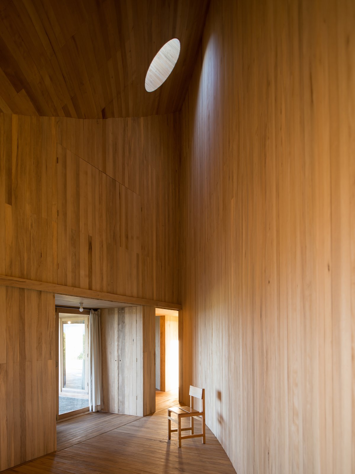 A circular skylight illuminate the living areas.
