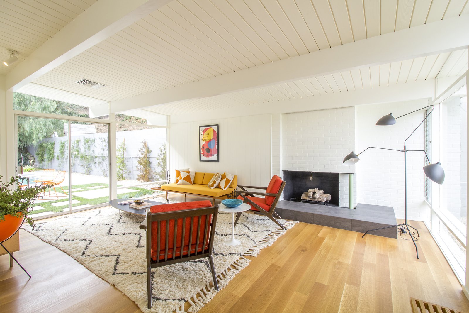A fireplace in the den.