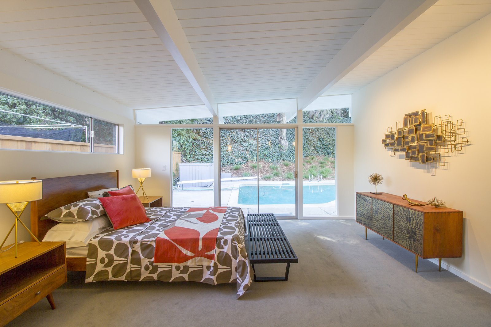 The owners can access the pool in the backyard via sliding doors in the master bedroom.
