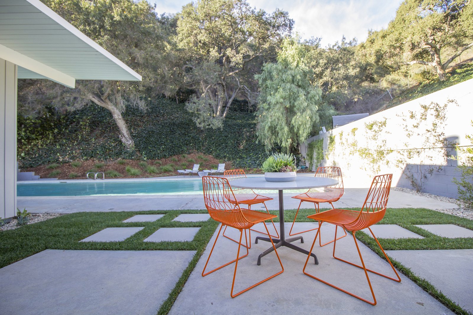 An outdoor patio where the owners can enjoy some Californian sunshine after a swim.