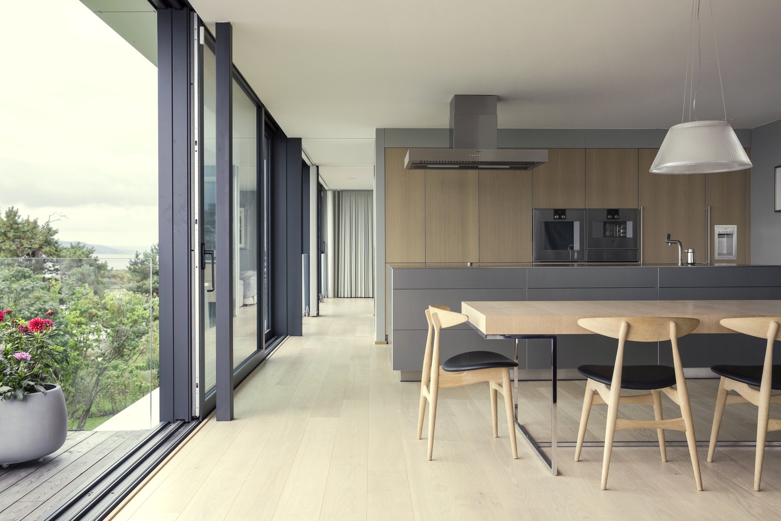 The dining room opens to a raised outdoor deck.