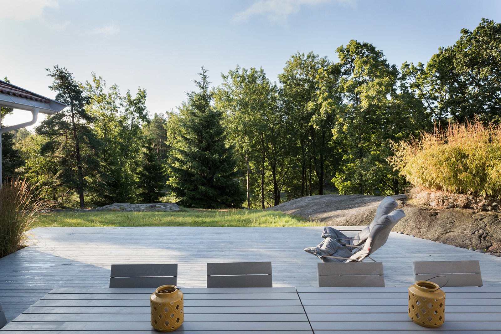 The large outdoor terrace surrounded by trees.