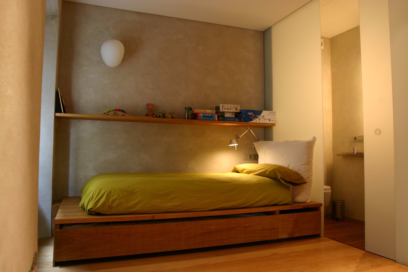 The children's bedroom with a pullout storage area.