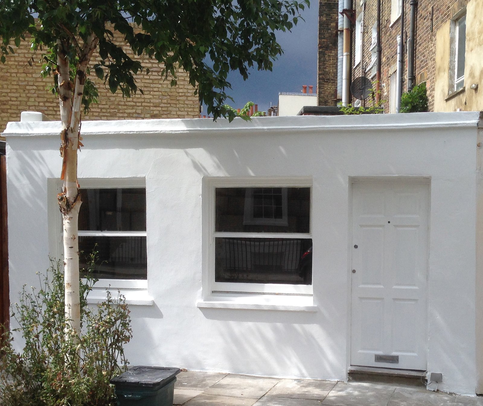 The exterior of a compact 140-square-foot micro-apartment in north London.
