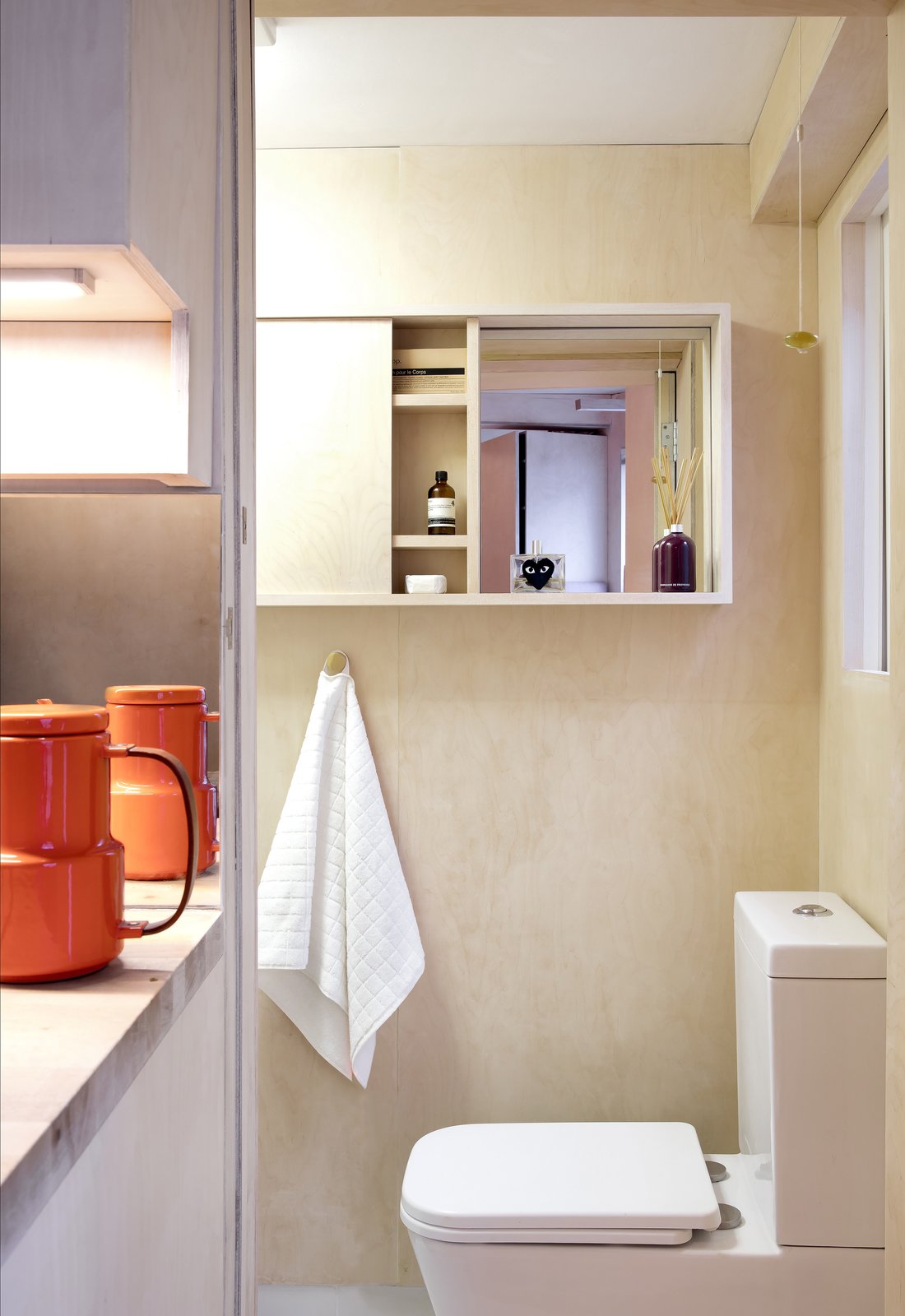 The bathroom is the only space that's separated by a wall.