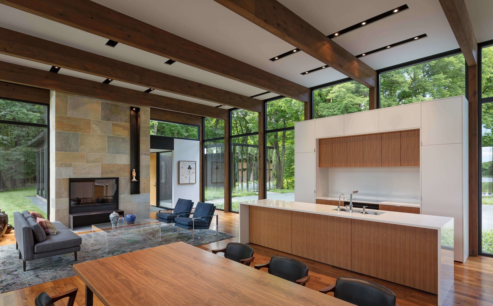 The open-plan living, dining and kitchen are located in the largest wing.