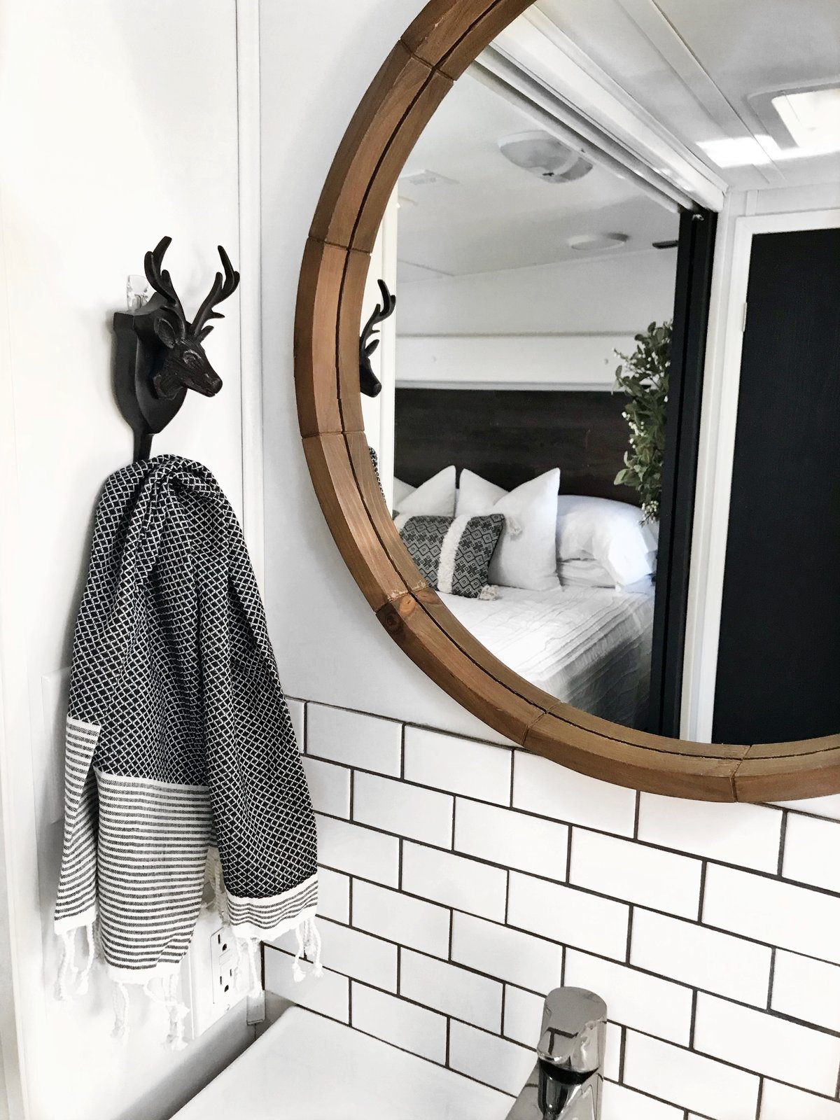 A chrome-plated, Ikea Brogrund bath faucet with strainer.