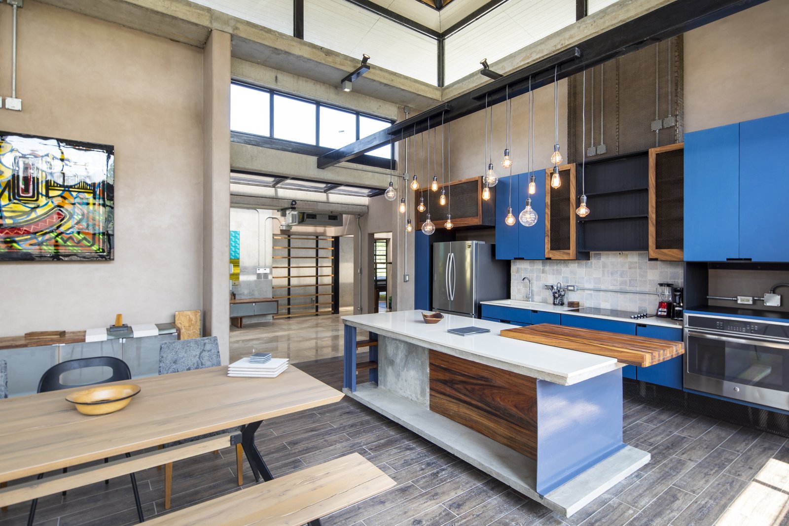 The kitchen and dining connects to the living room.