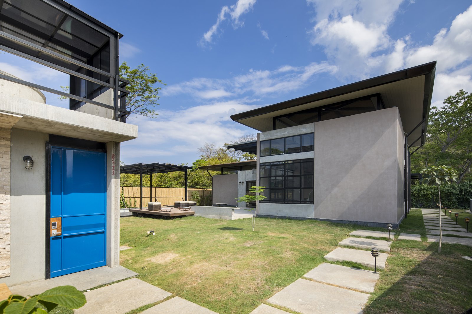 Garden spaces surround the buildings.