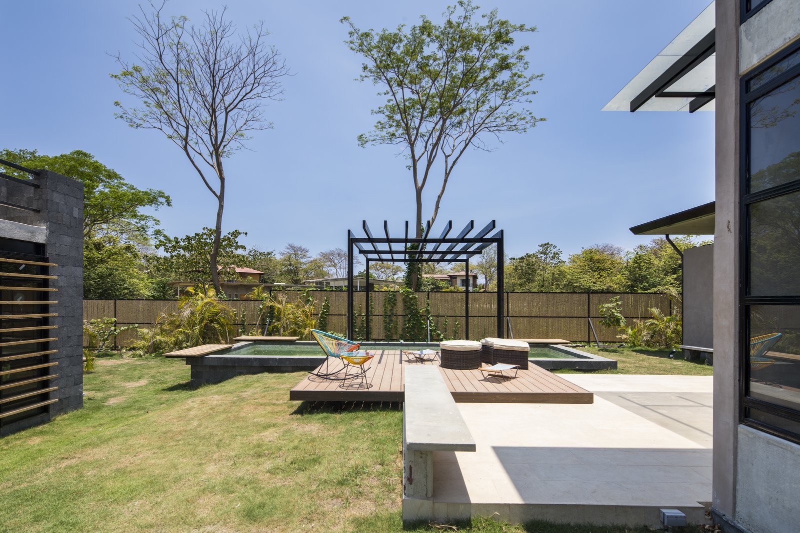 A pool and sun deck on the eastern side of the plot.