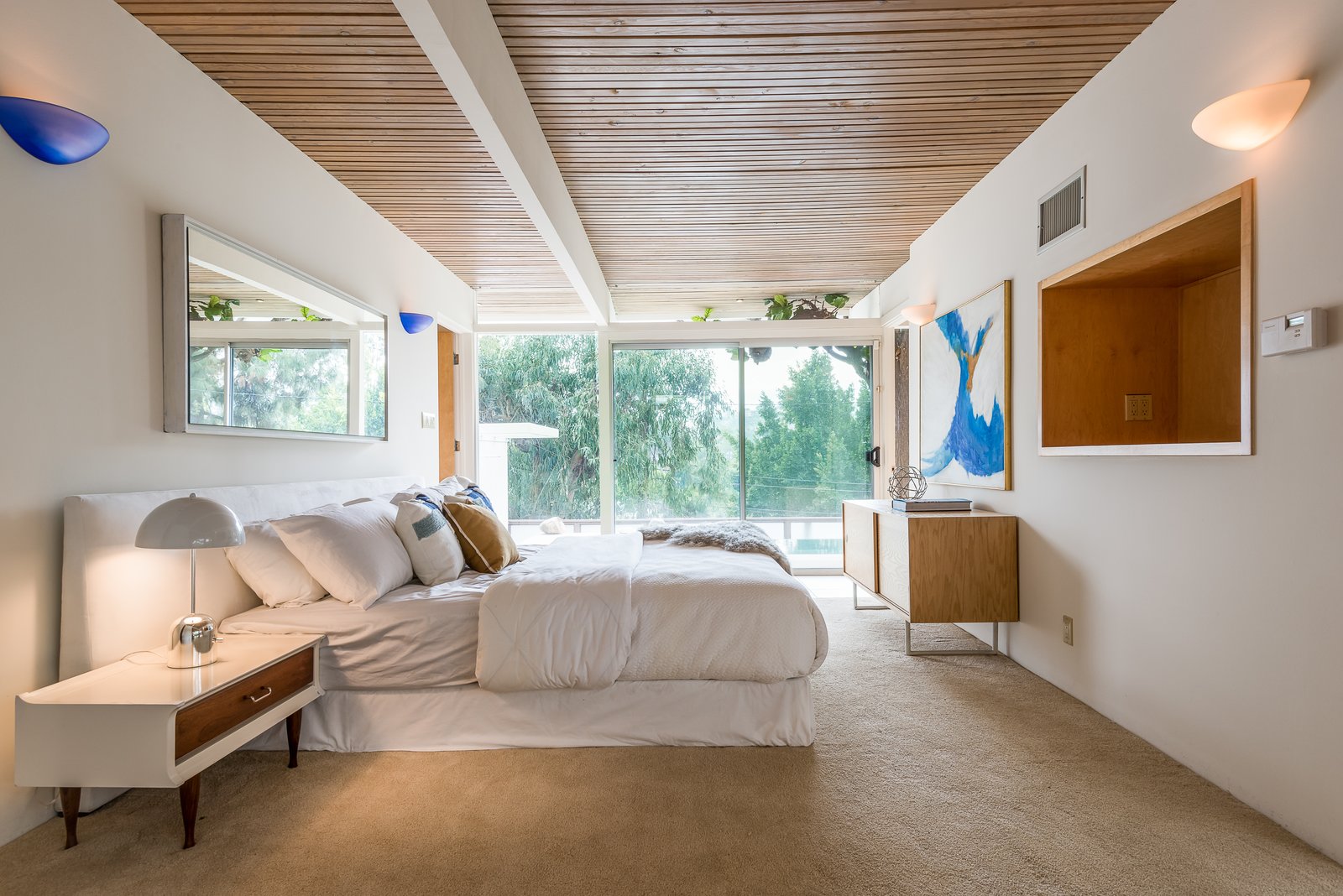 A bedroom that looks out to canyon views.