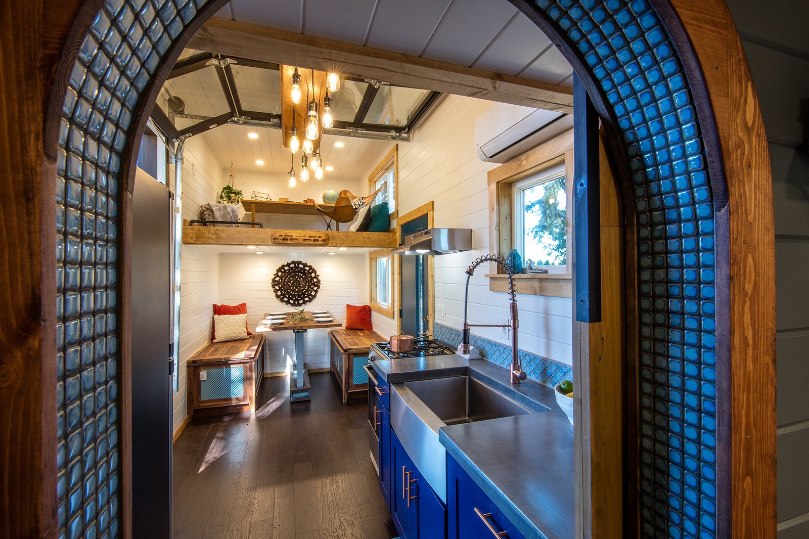 A view of the kitchen, dining and study-lounge loft from the bathroom.