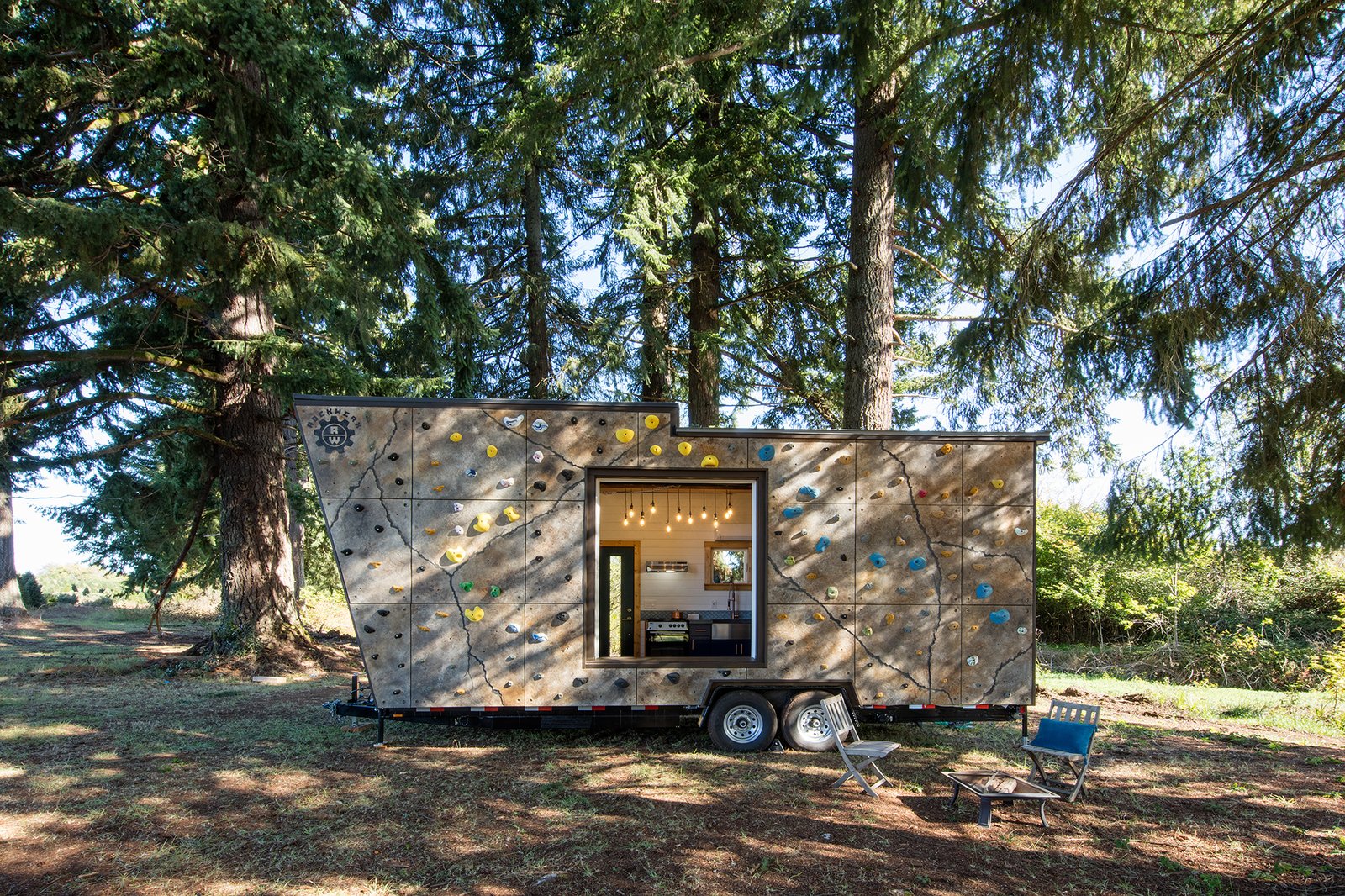 A custom rock wall system that takes care of the couple's shared passion for bouldering.