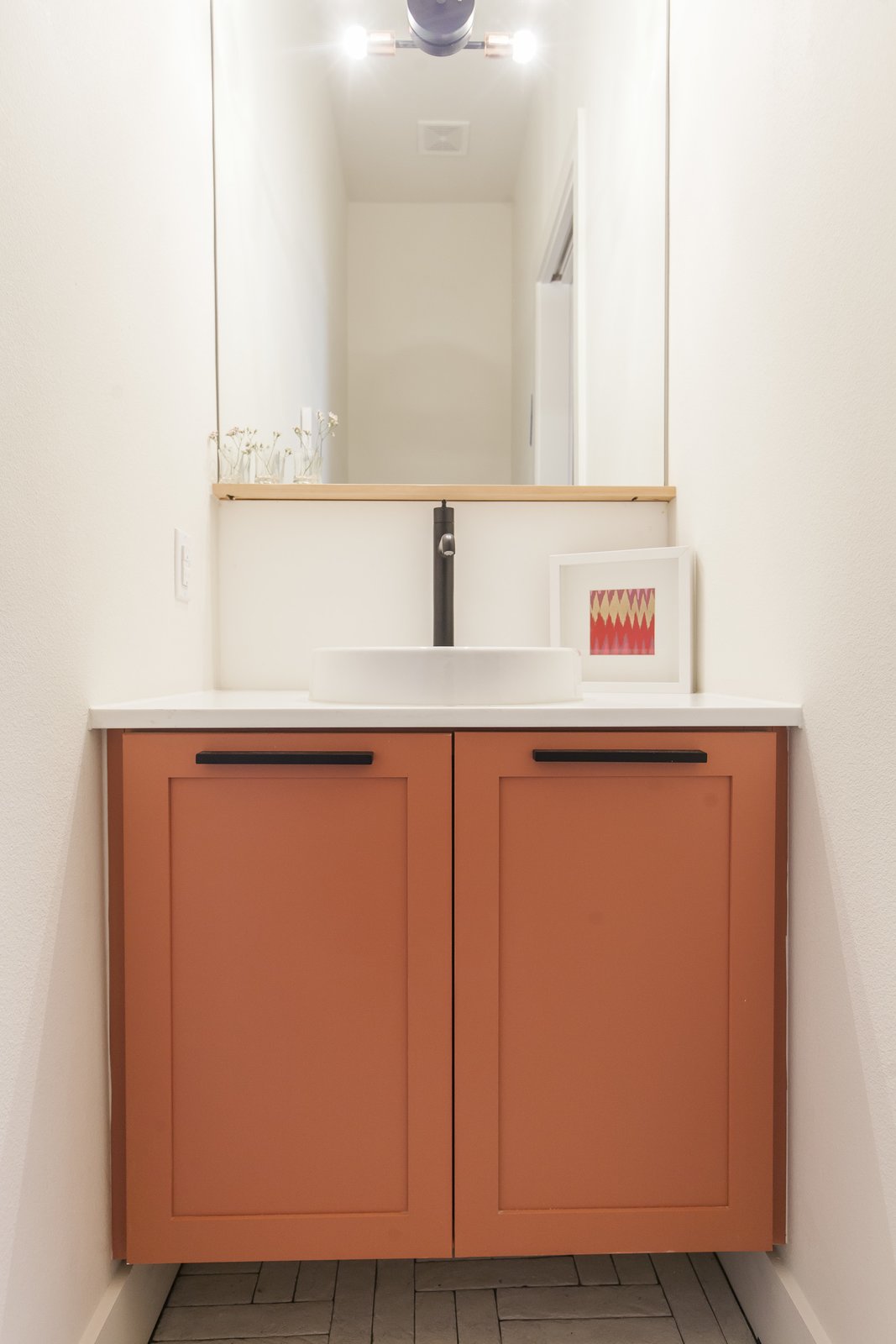 My favorite - Unit A powder room. Simple and unique.